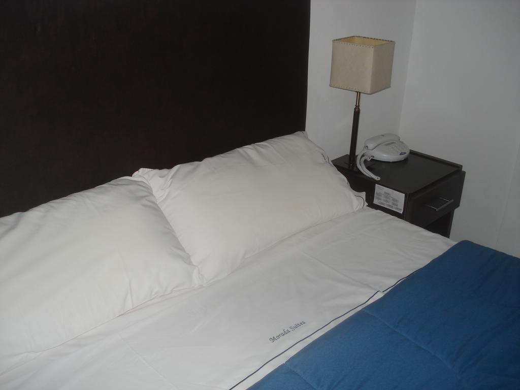 Morada Suites Campana Exterior foto