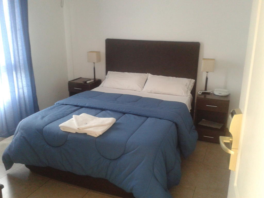 Morada Suites Campana Quarto foto