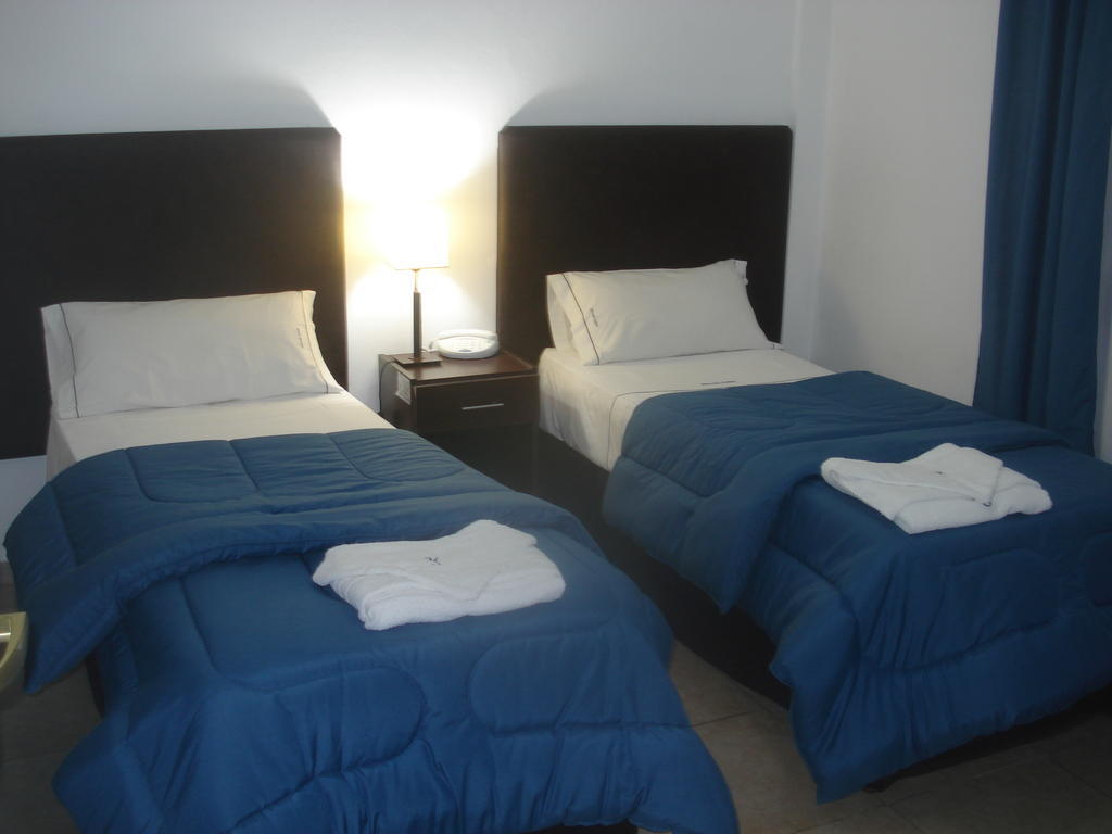 Morada Suites Campana Quarto foto
