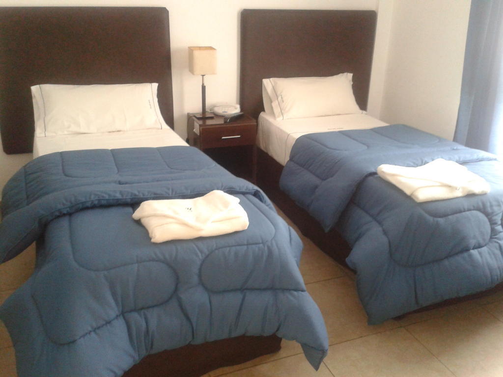 Morada Suites Campana Quarto foto