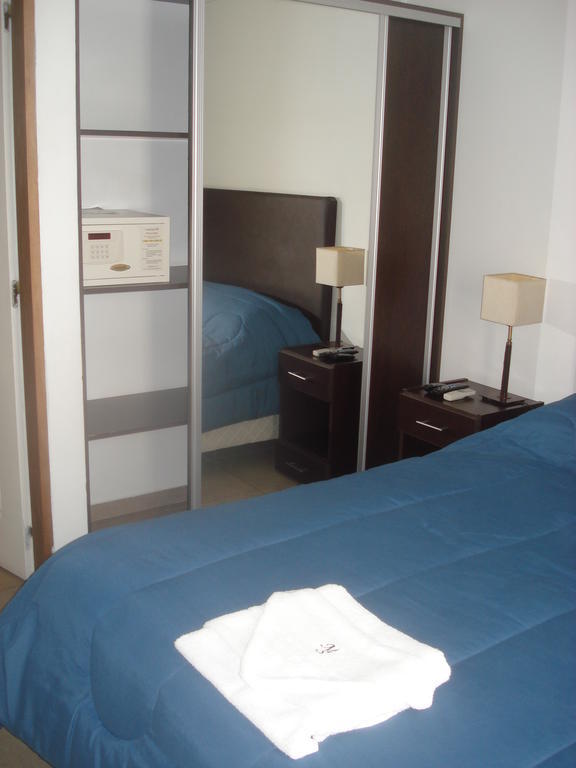 Morada Suites Campana Quarto foto