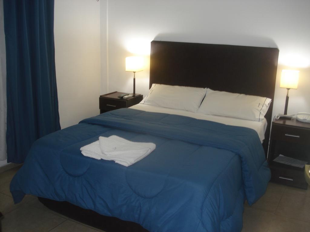 Morada Suites Campana Quarto foto