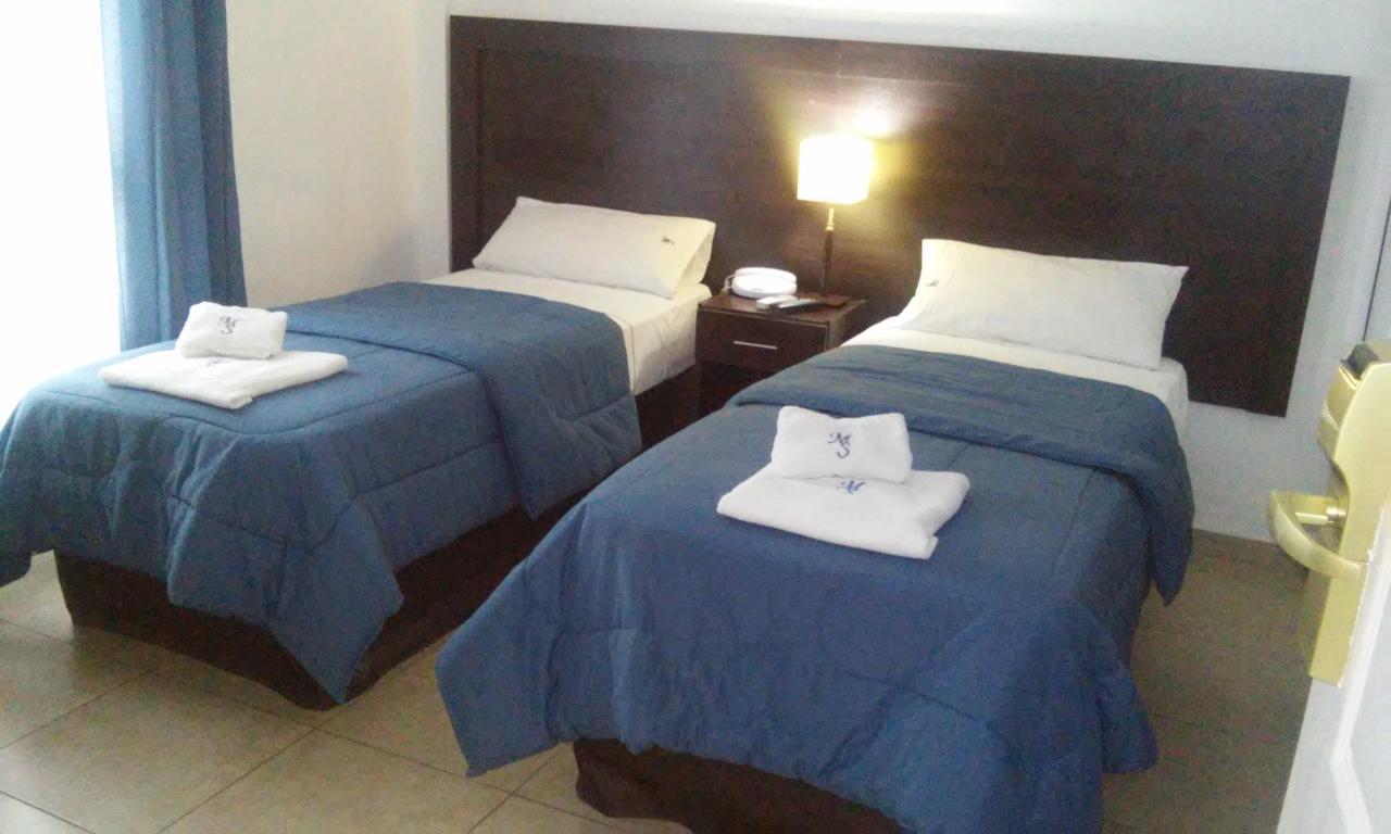 Morada Suites Campana Exterior foto