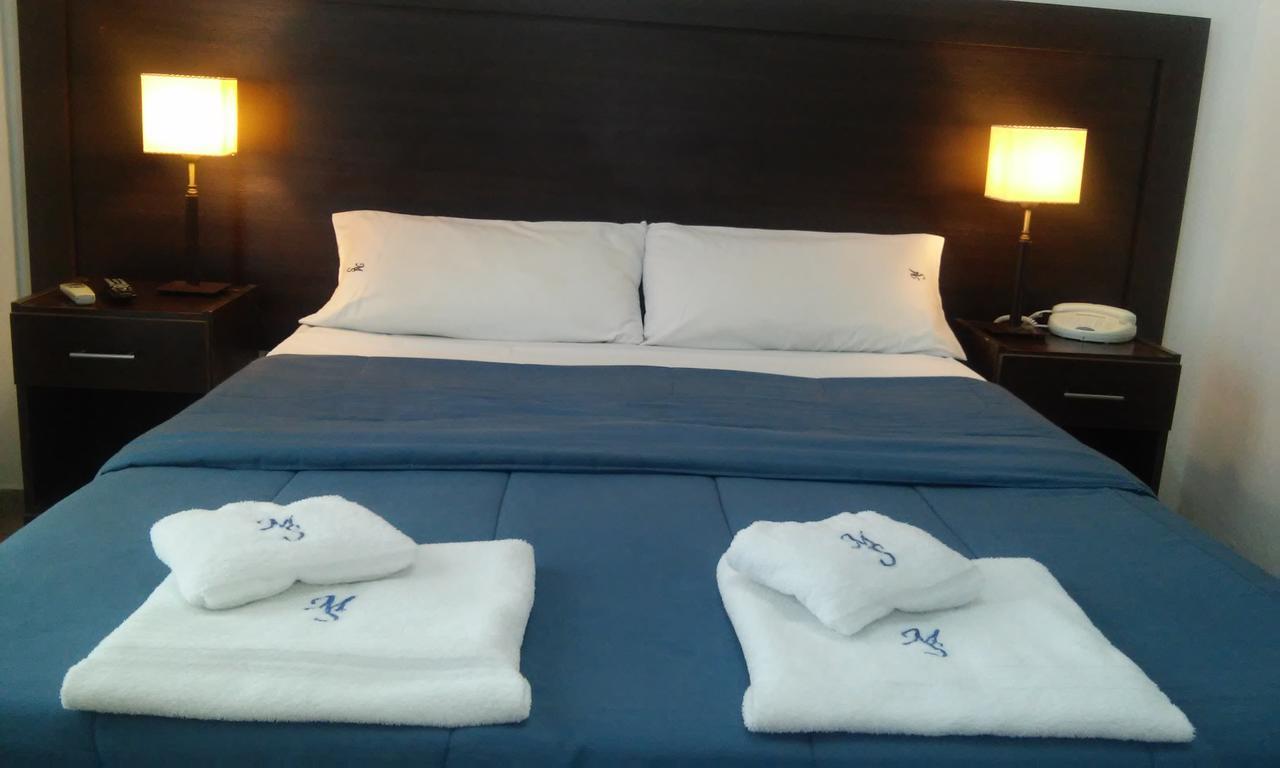 Morada Suites Campana Exterior foto
